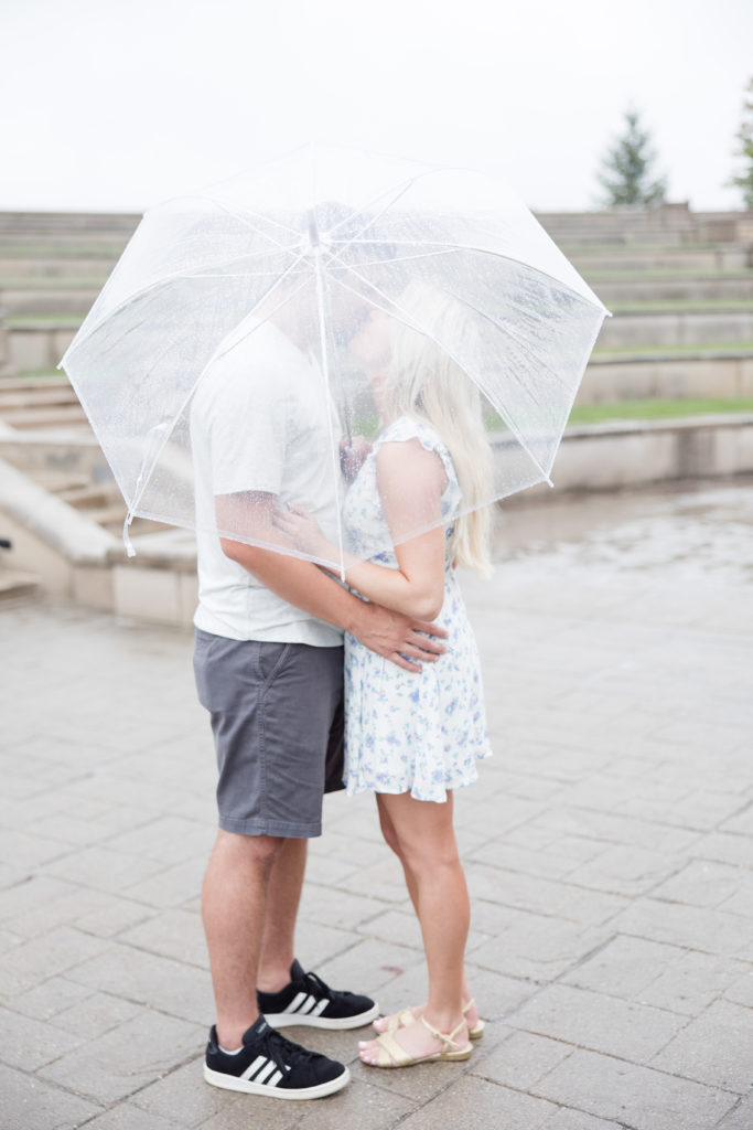 Kaitlin Mendoza Photography captured the engagement photos in Carmel, Indiana at Coxhall Gardens and The Palladium