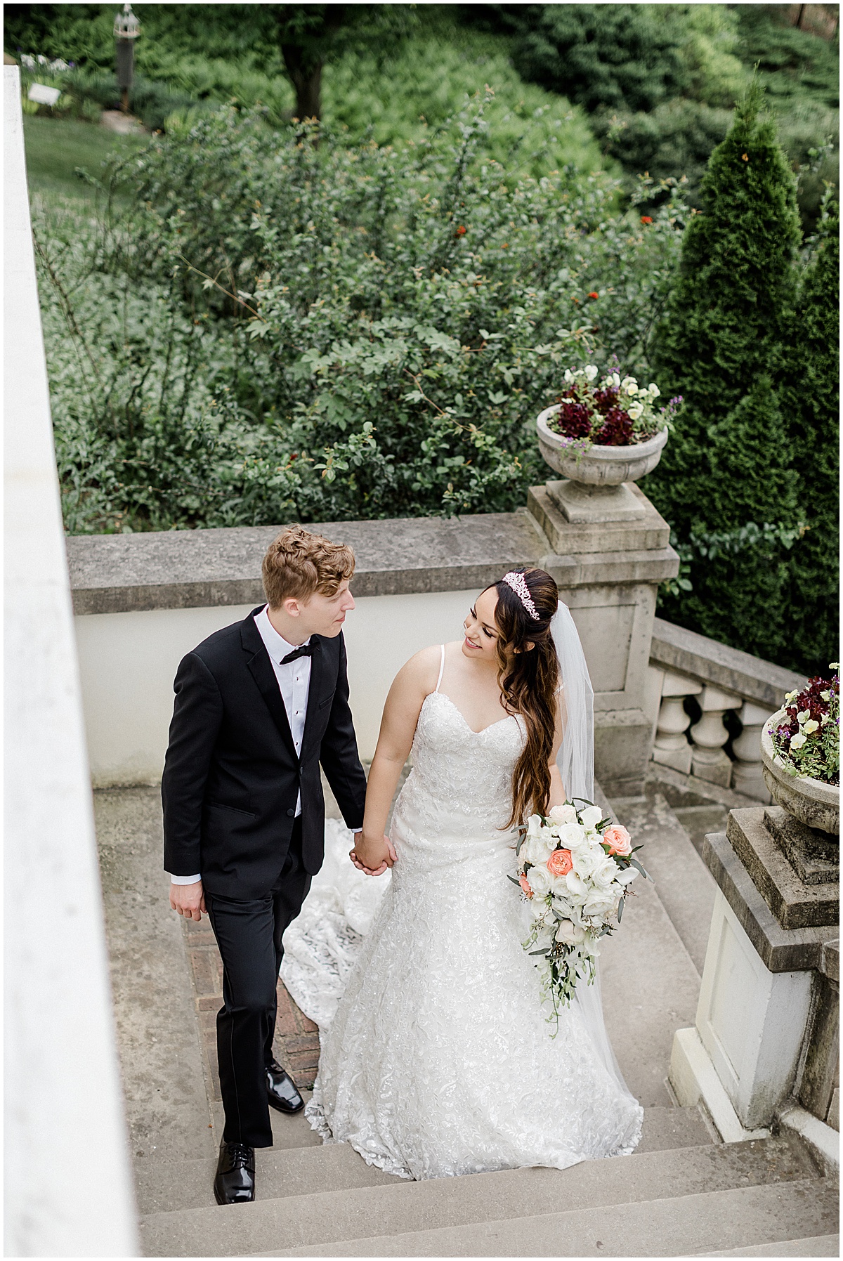 Classic church wedding in Indianapolis , Indiana and portraits at Newfields in Indianapolis captured by Kaitlin Mendoza Photography associate team