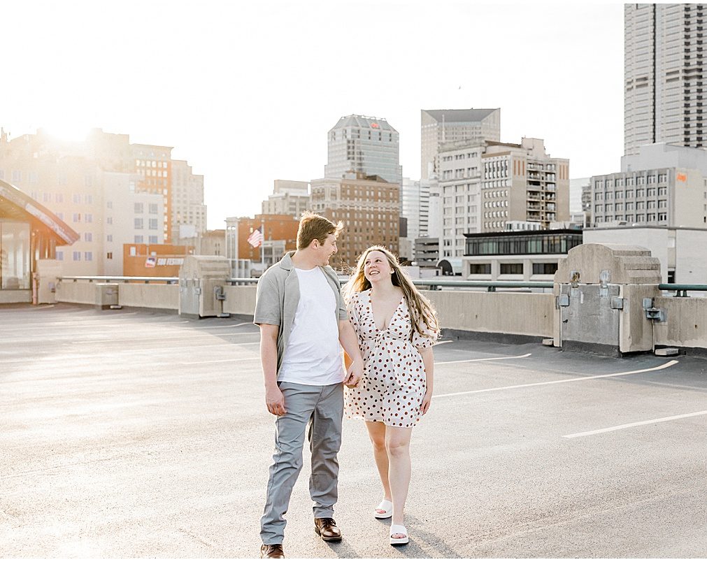 Indianapolis engagement photos on the rooftop of a parking garage.