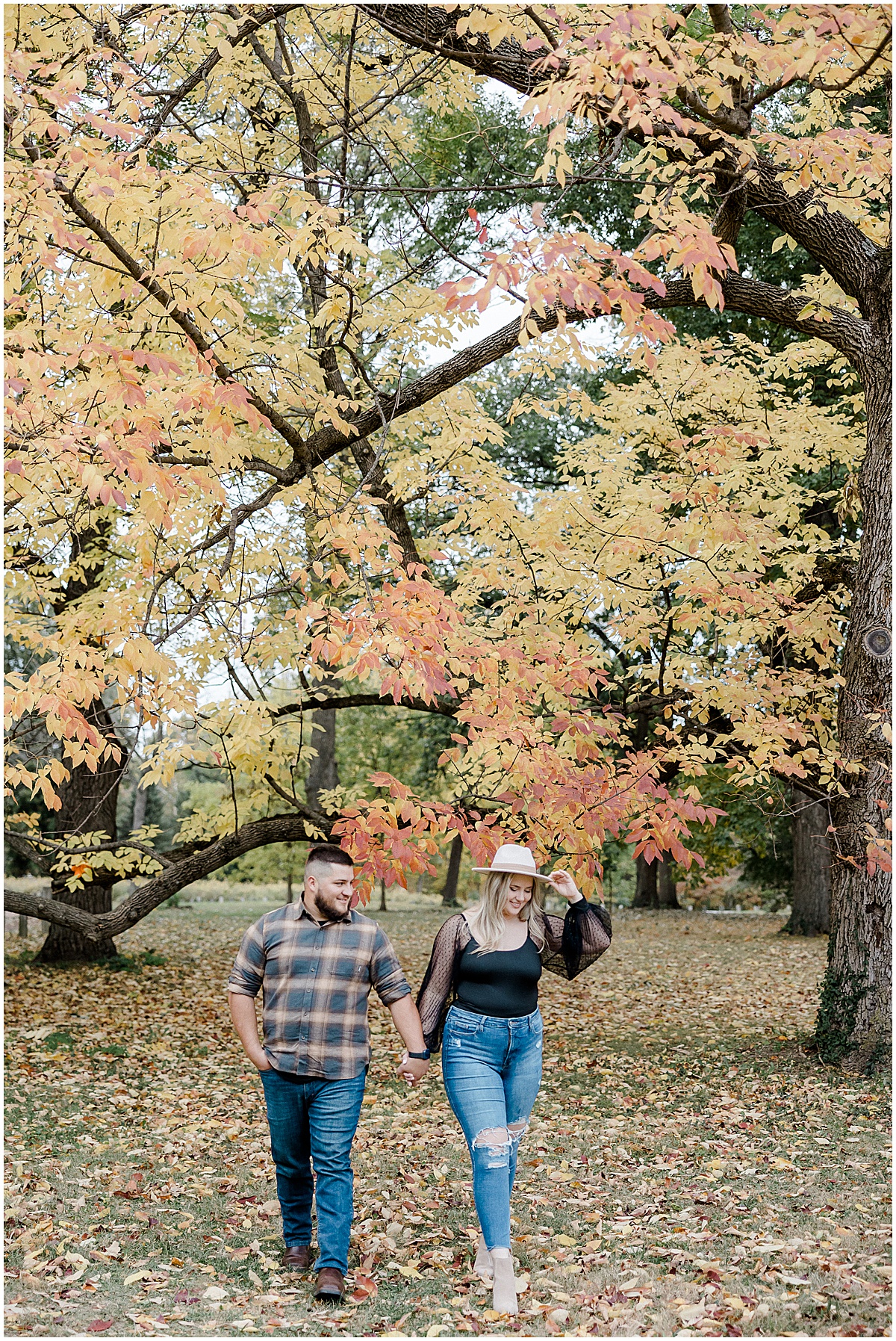 A Holliday Park Engagement Session in Indianapolis, Indiana in the Fall photographed by Kaitlin Mendoza Photography.