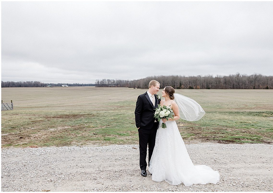 Calie and Clayton’s Columbus, Indiana wedding captured by Kaitlin Mendoza Photography.