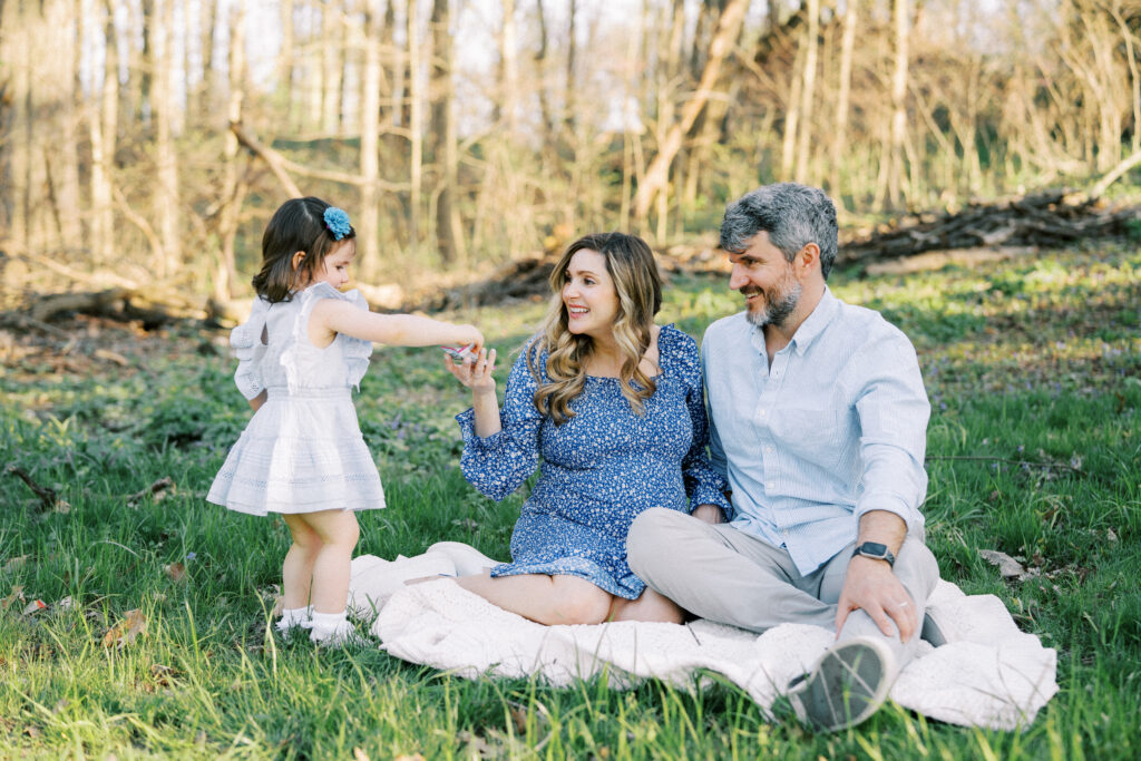 pregnant mom with husband and child at holliday park in indianapolis