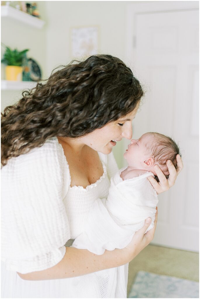 Kaitlin Mendoza is a Carmel, Indiana newborn photographer who took photos of Evie and her first time parents in their home.