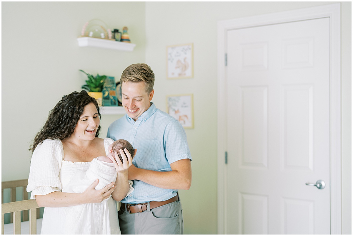 Kaitlin Mendoza is a Carmel, Indiana newborn photographer who took photos of Evie and her first time parents in their home.