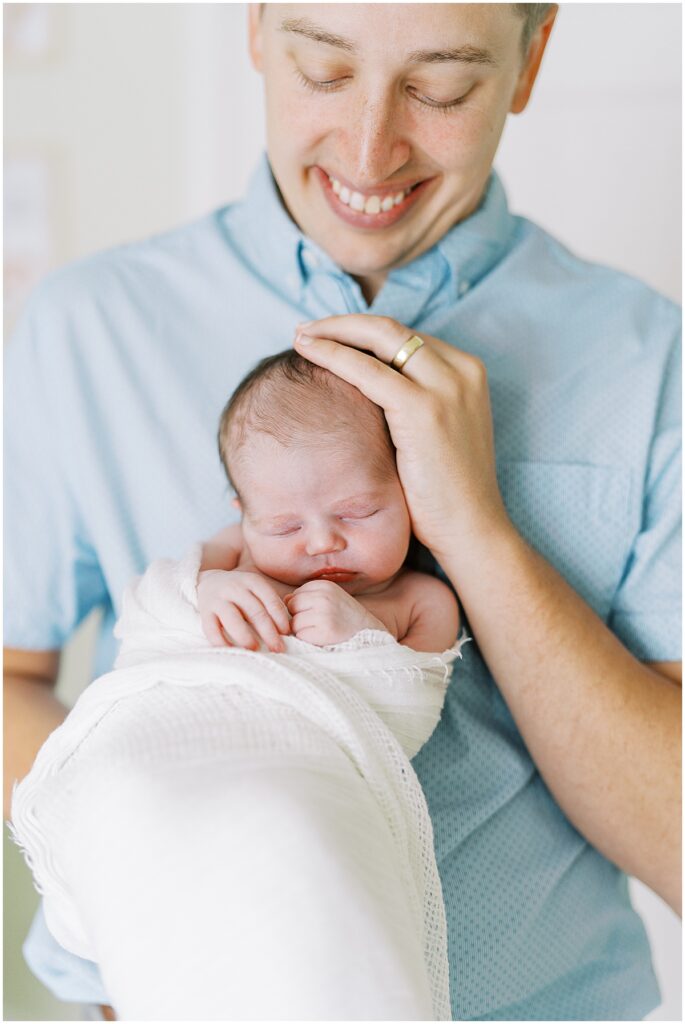 Kaitlin Mendoza is a Carmel, Indiana newborn photographer who took photos of Evie and her first time parents in their home.