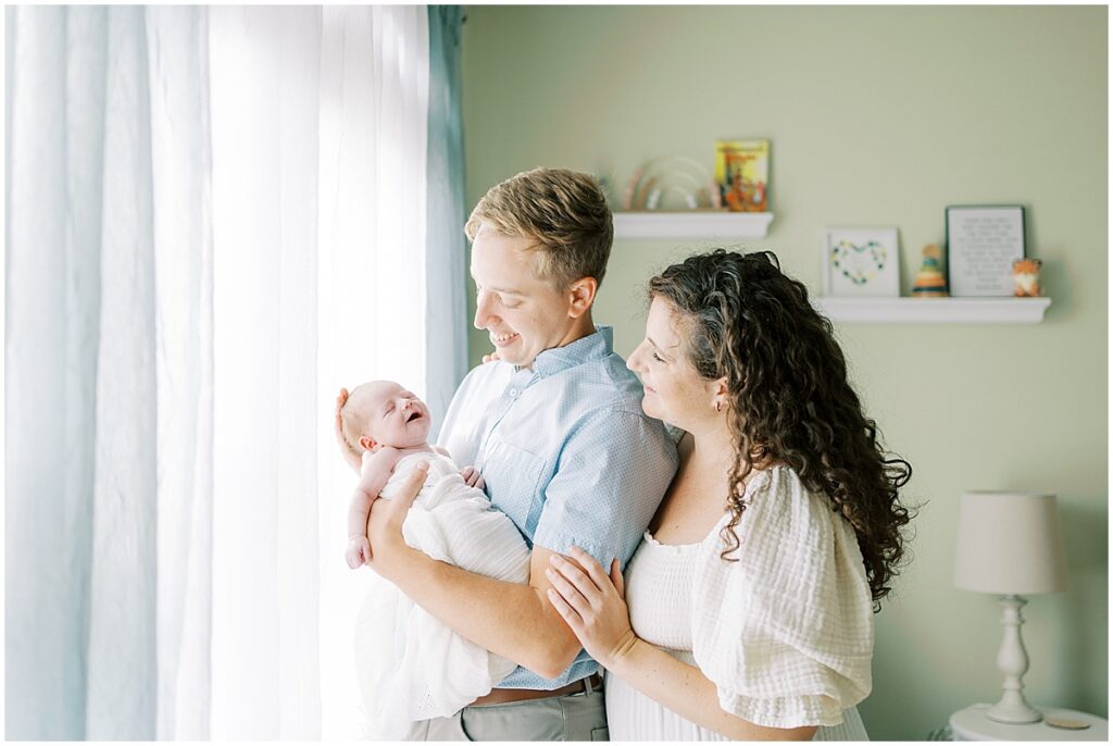 Kaitlin Mendoza is a Carmel, Indiana newborn photographer who took photos of Evie and her first time parents in their home.