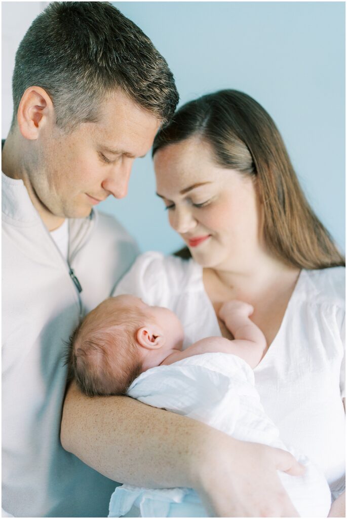 Kaitlin Mendoza is an in-home Indianapolis newborn photographer who took photos of Eli and this adorable family of four.