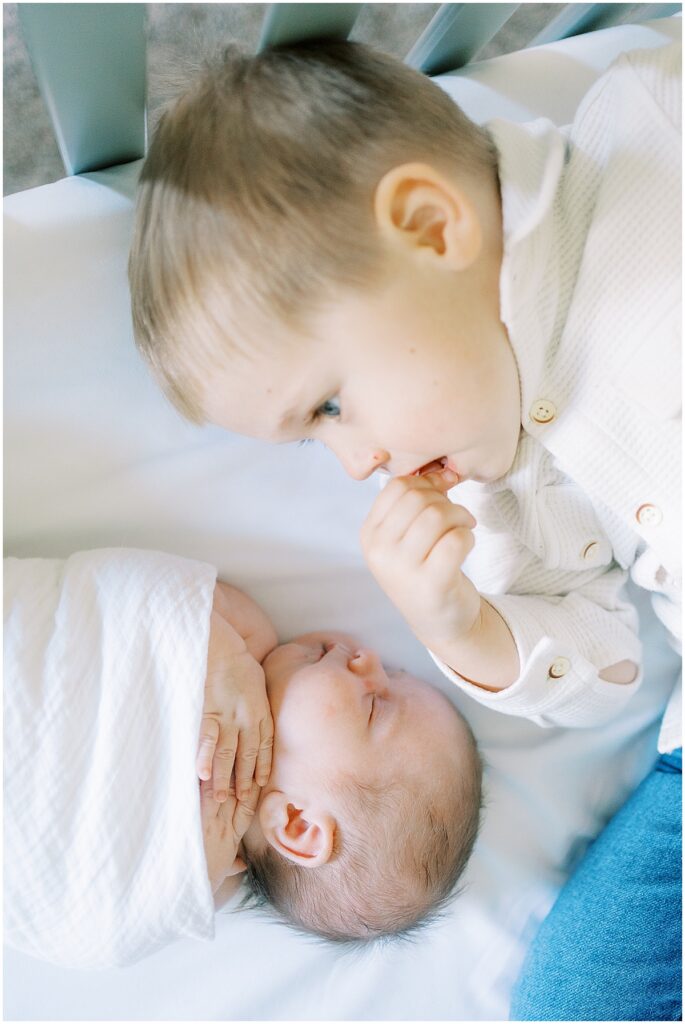 Kaitlin Mendoza is an in-home Indianapolis newborn photographer who took photos of Eli and this adorable family of four.