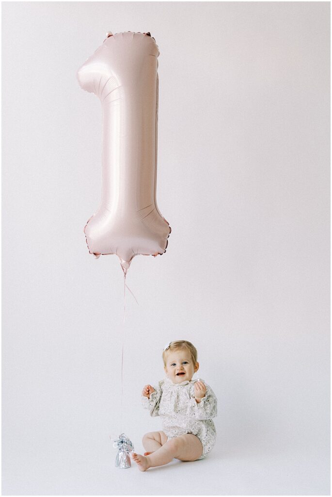 Kaitlin Mendoza was the studio Indianapolis milestone photographer for Bridget’s one year photo session.