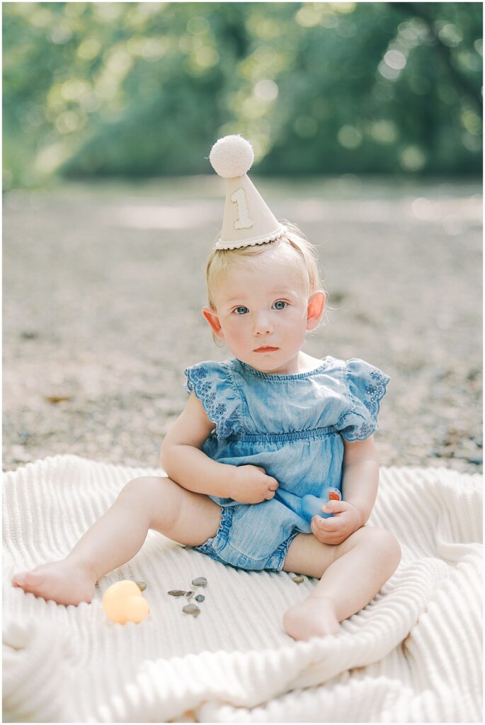 Kaitlin Mendoza is a Carmel, Indiana family photographer who captured a family and 1 year milestone photo session at Flowing Well Park.