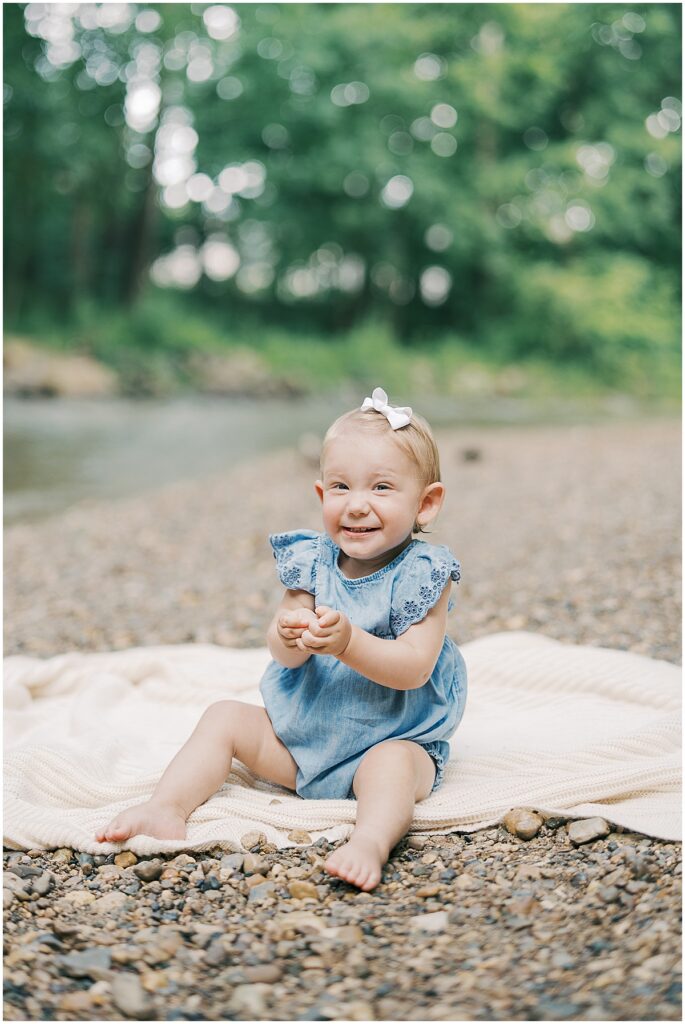 Kaitlin Mendoza is a Carmel, Indiana family photographer who captured a family and 1 year milestone photo session at Flowing Well Park.