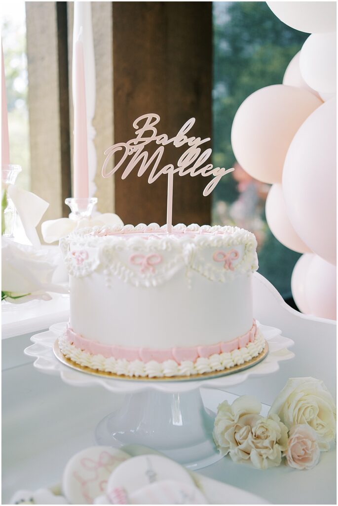 Pink bow cake for Bonjour Bébé themed Carmel, Indiana baby shower