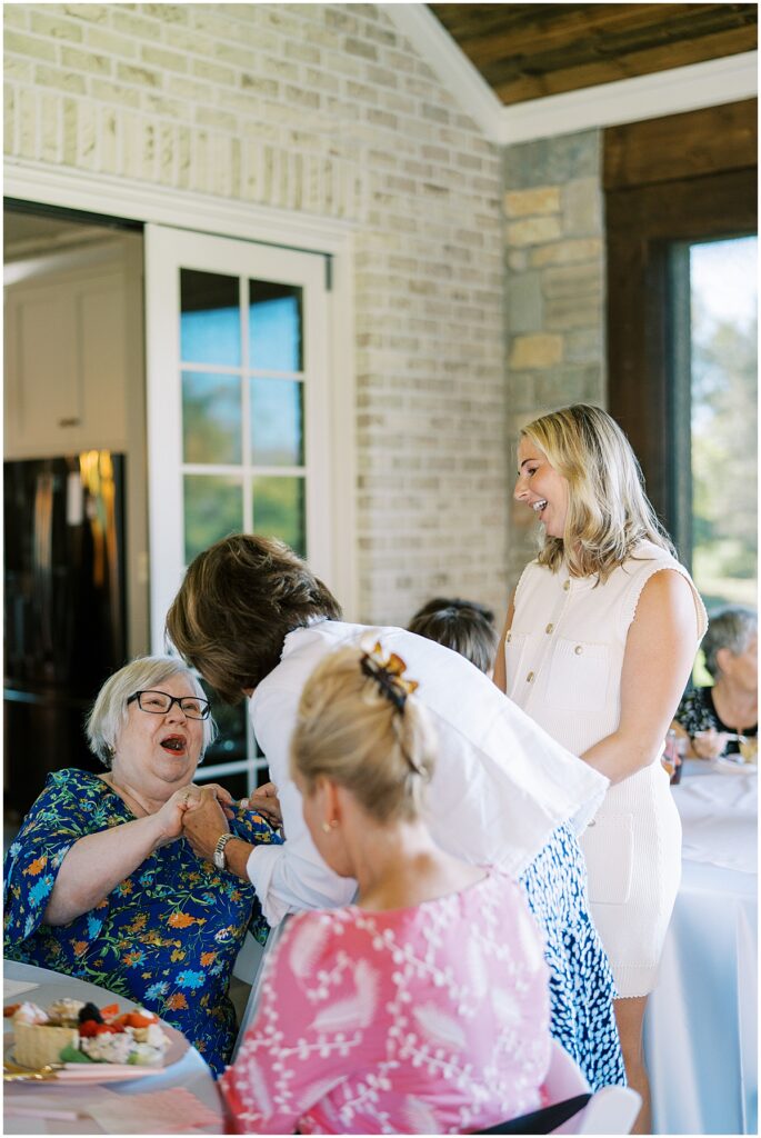 Event photos of guests enjoying summer baby shower