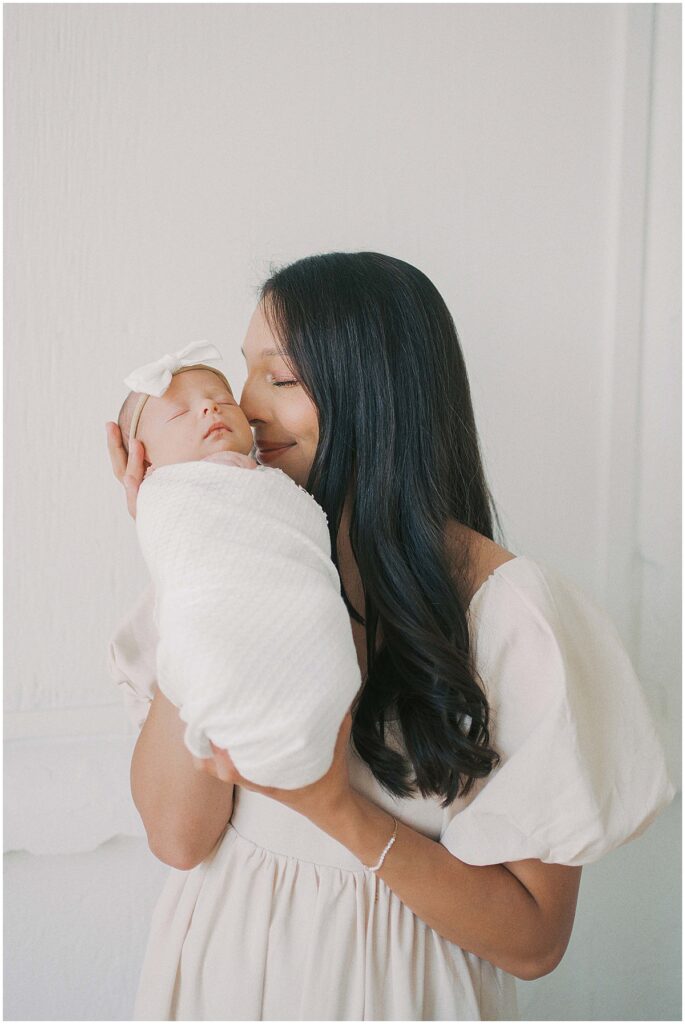 White and cream styled in studio newborn session by Kaitlin Mendoza Photography