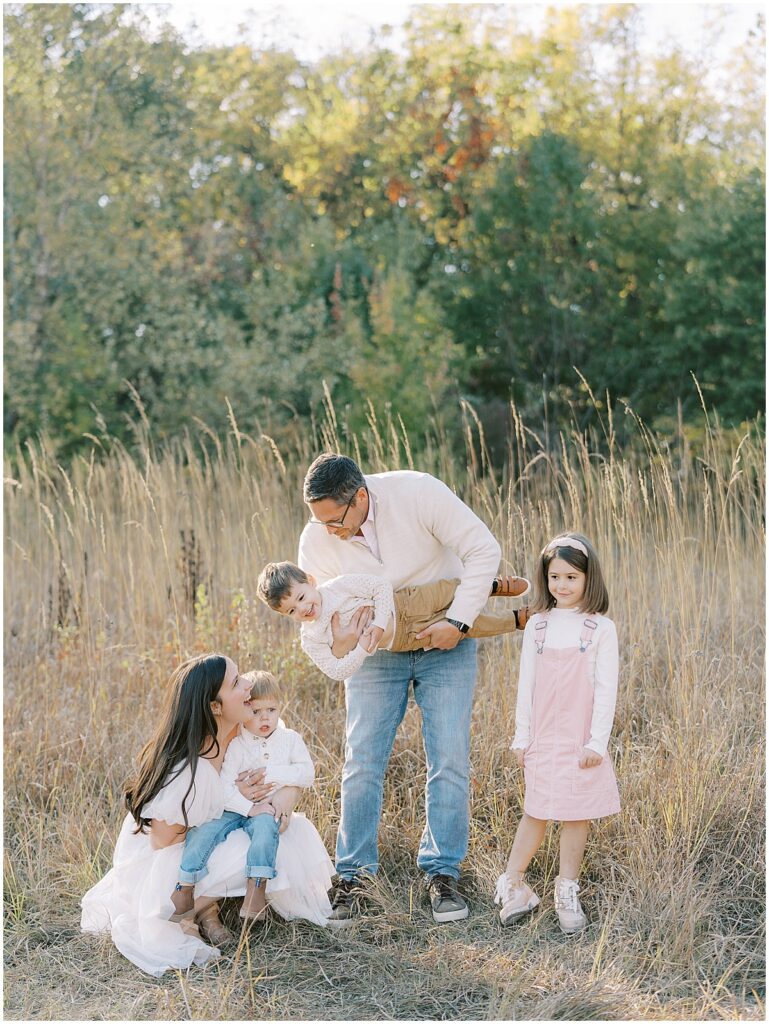 Group photo surrounded by fall plants in Central Park, Carmel Indiana