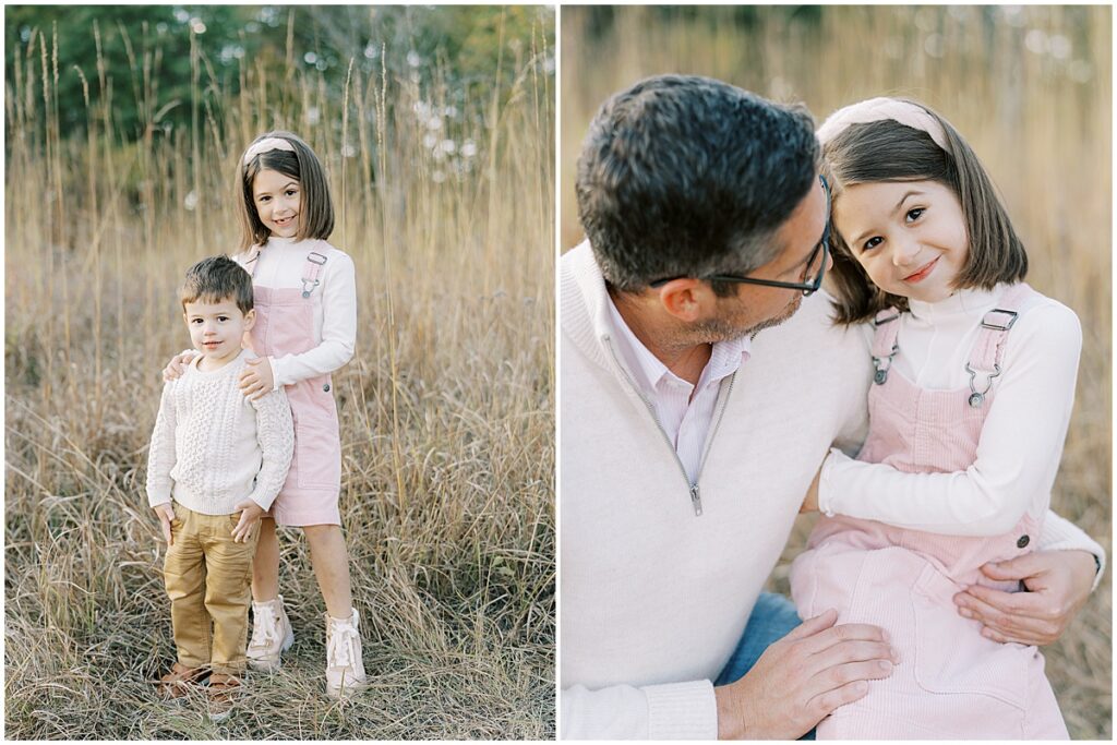 Dad in cream sweater hugs daughter in light pink during fall family photo session