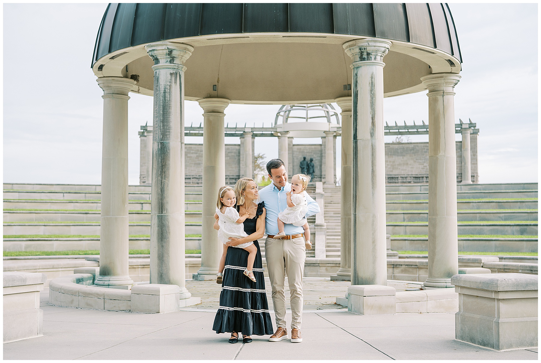 Family of four under dome at Coxhall Gardens during summer photos