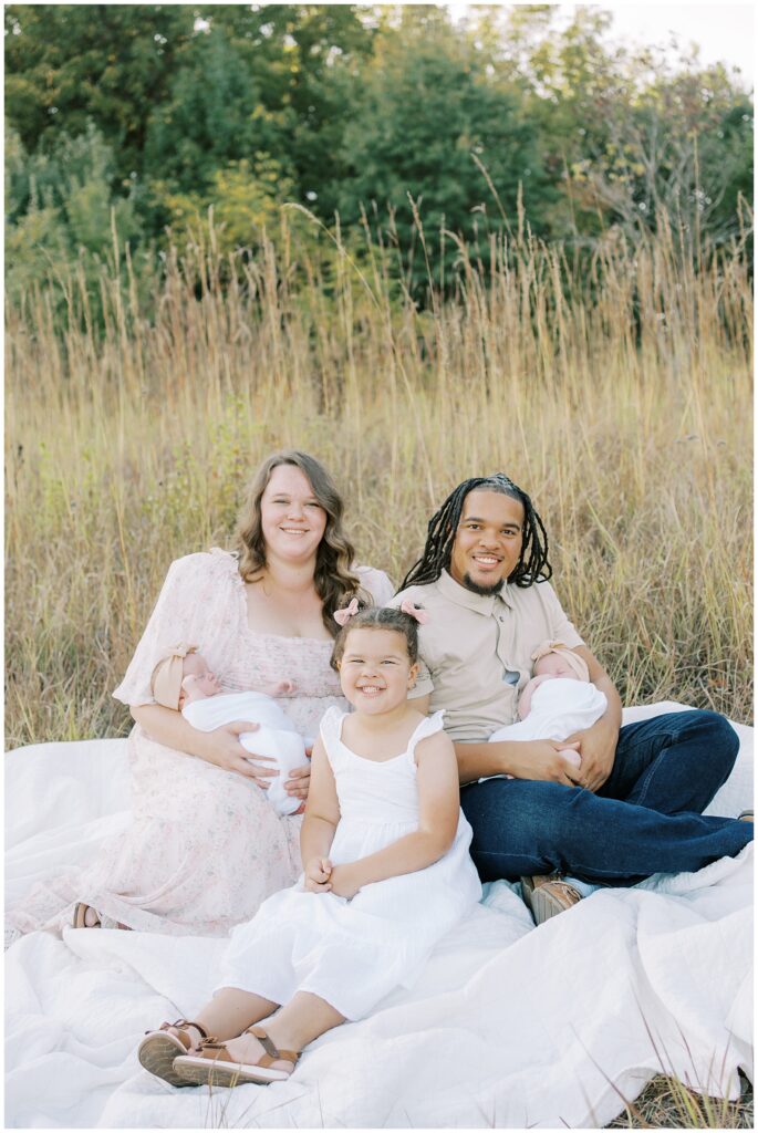 Family of five at newborn session at Central Park Carmel Indiana