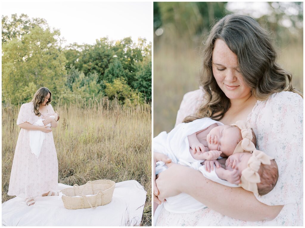 Mom in field holding twin newborns during family photo session