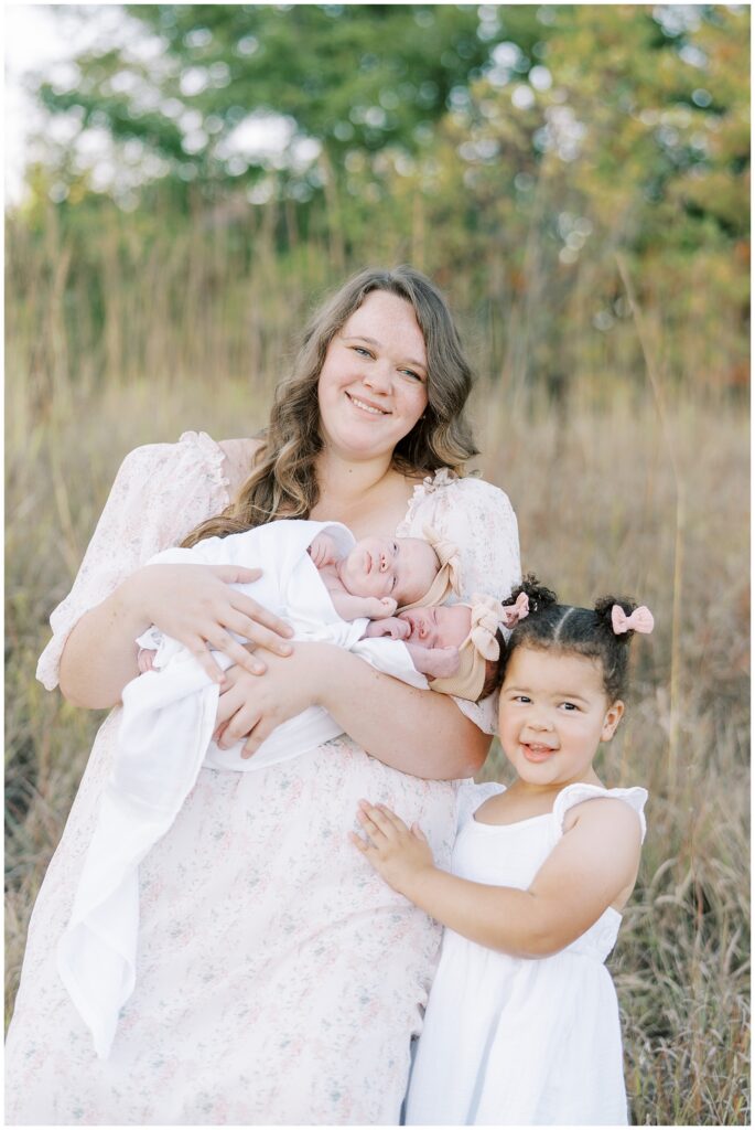 Mother with three daughters in Central Park Carmel Indiana