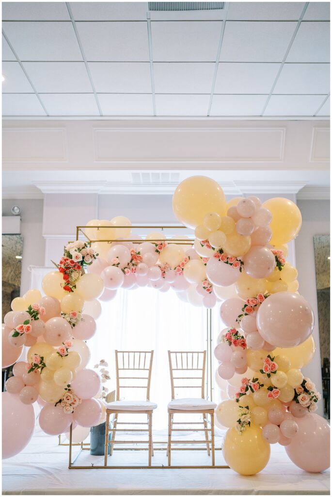 Pink and Yellow balloon arch at Baby Shower at Ritz Charles in Carmel, Indiana