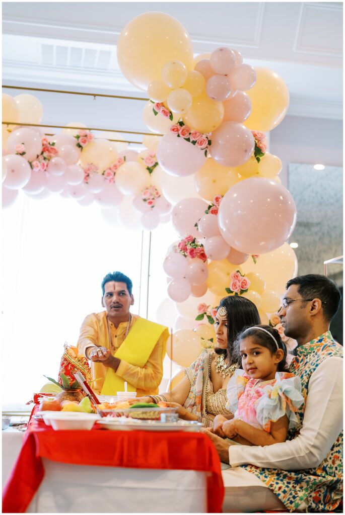 Family having traditional ceremony at Baby Shower at Ritz Charles in Carmel, Indiana