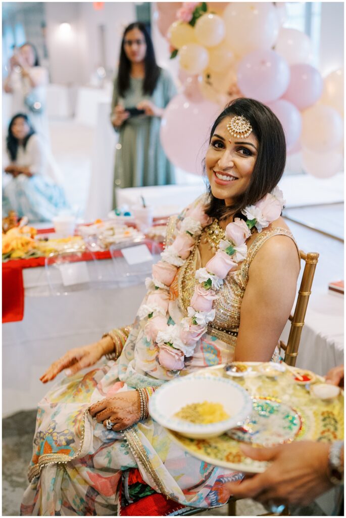Family having traditional ceremony at Baby Shower at Ritz Charles in Carmel, Indiana
