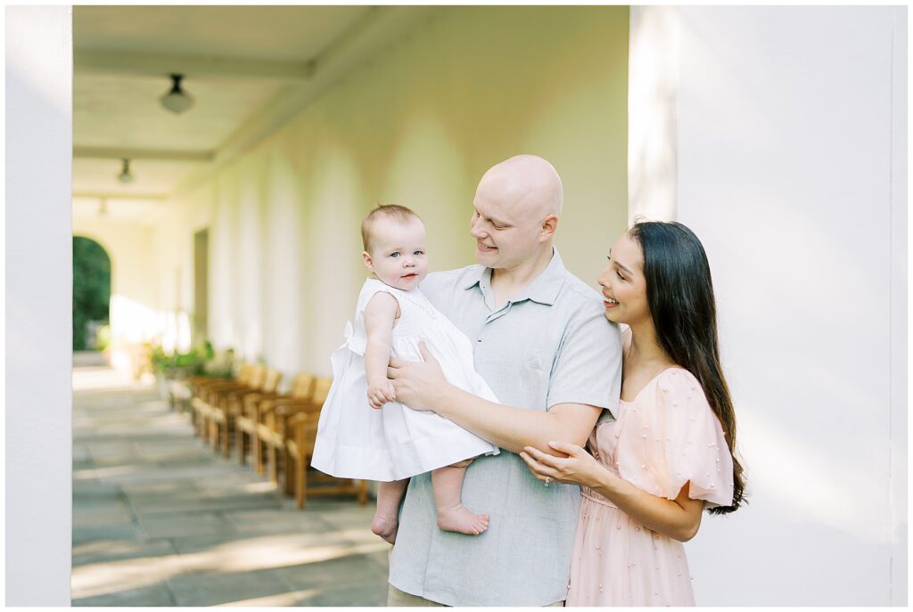 Outdoor milestone session with family of three